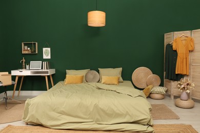 Stylish bedroom with modern furniture. Interior design Photo of Stylish bedroom with modern furniture. Interior design