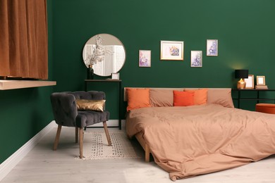 Stylish bedroom with modern furniture. Interior design Photo of Stylish bedroom with modern furniture. Interior design