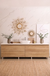 Modern bathroom interior with stylish mirror and vessel sink Photo of Modern bathroom interior with stylish mirror and vessel sink