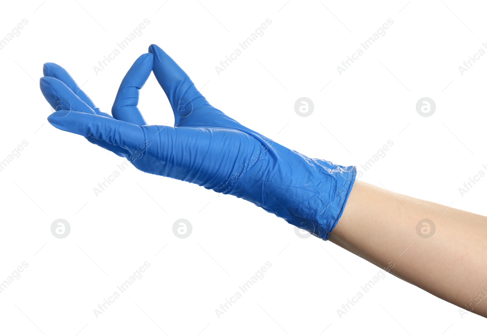 Woman in blue latex gloves holding something on white background, closeup of hand Photo of Woman in blue latex gloves holding something on white background, closeup of hand