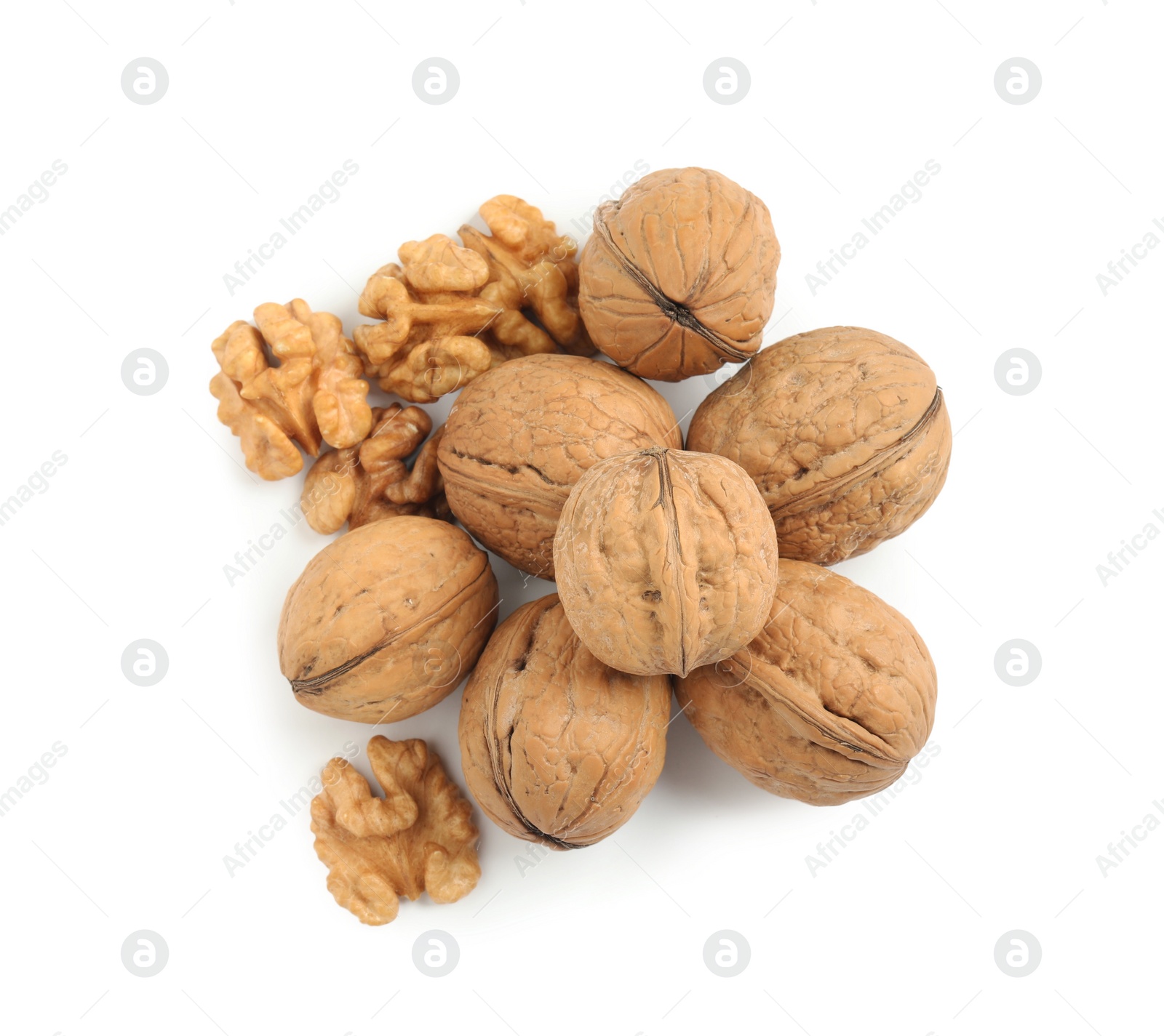 Pile of ripe walnuts on white background, top view Photo of Pile of ripe walnuts on white background, top view