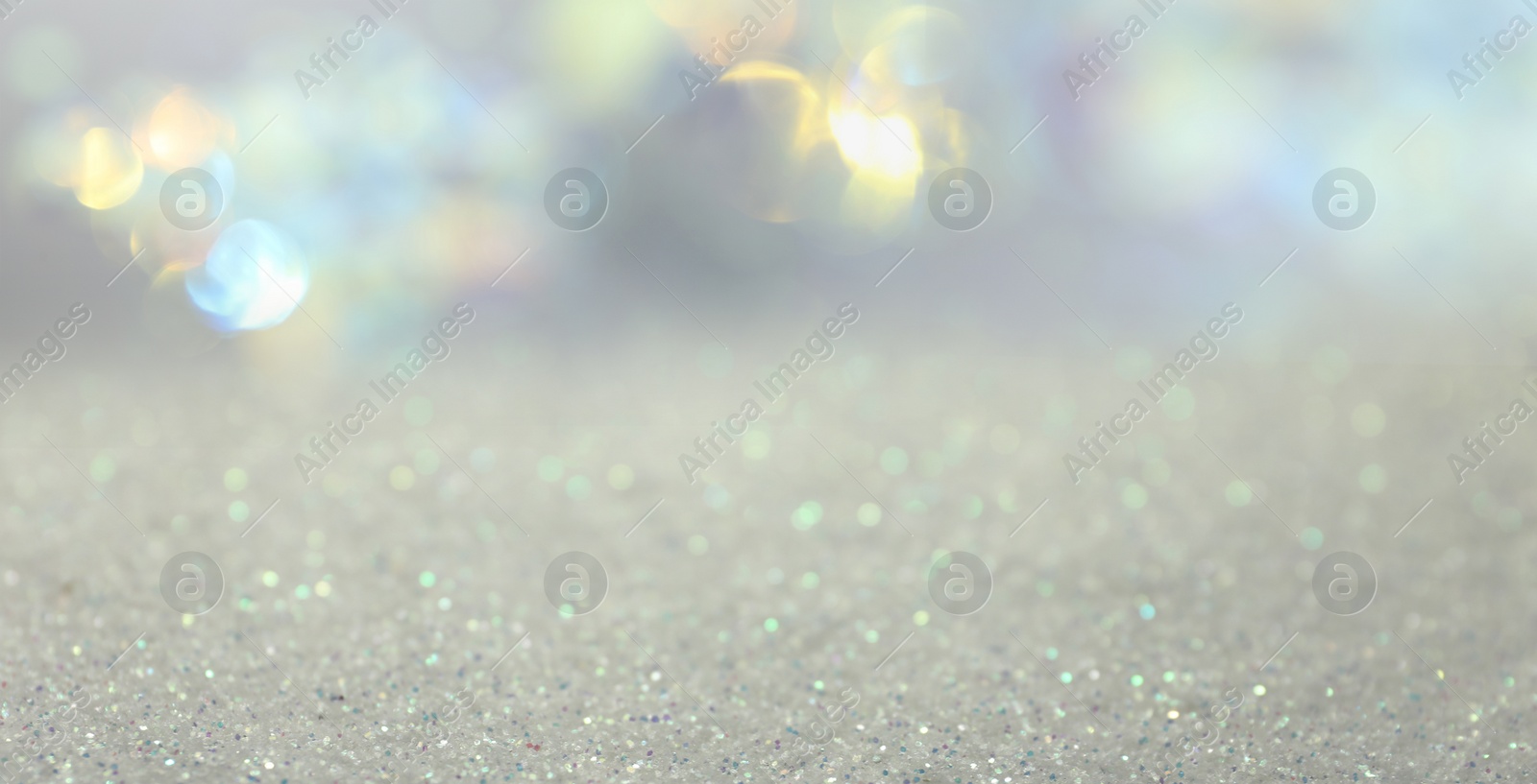 Shiny glitter and blurred lights on background, banner design. Bokeh effect Image of Shiny glitter and blurred lights on background, banner design. Bokeh effect