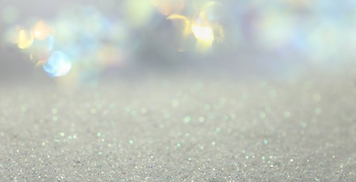 Shiny glitter and blurred lights on background, banner design. Bokeh effect Image of Shiny glitter and blurred lights on background, banner design. Bokeh effect