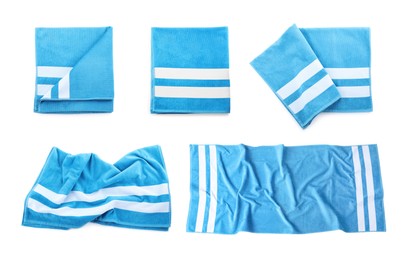 Set with soft towels on white background, top view Image of Set with soft towels on white background, top view