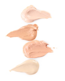 Liquid foundation on white background. Professional makeup products Photo of Liquid foundation on white background. Professional makeup products