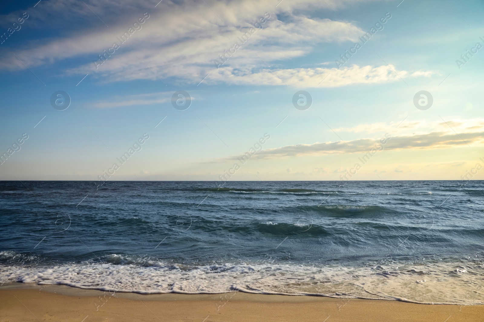 Picturesque view of beautiful sky with clouds over tropical beach Photo of Picturesque view of beautiful sky with clouds over tropical beach