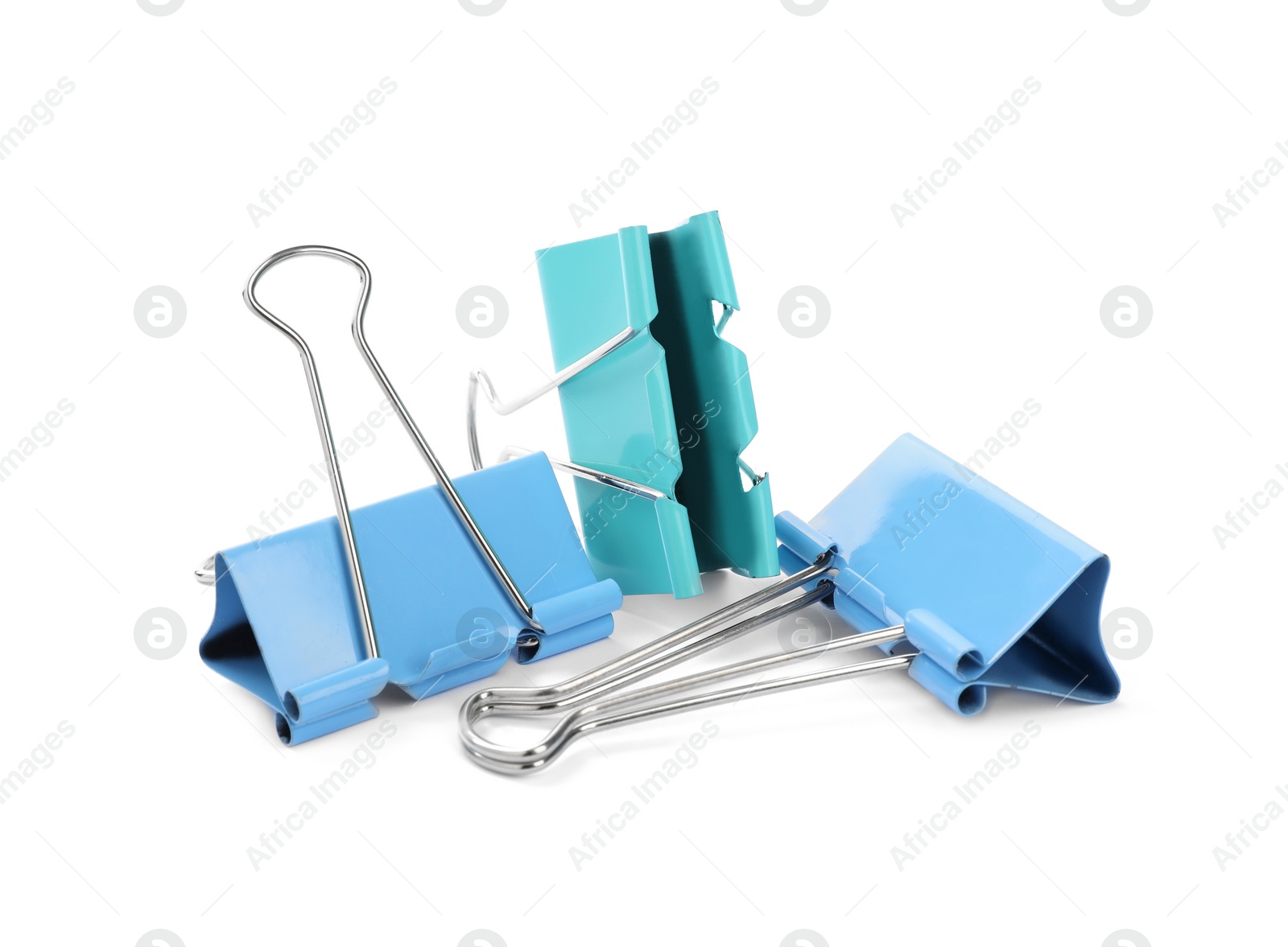Colorful binder clips on white background. Stationery Photo of Colorful binder clips on white background. Stationery