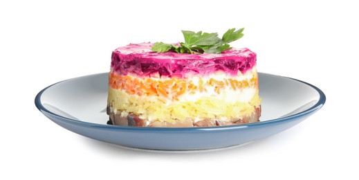 Photo of Herring under fur coat isolated on white. Traditional russian salad