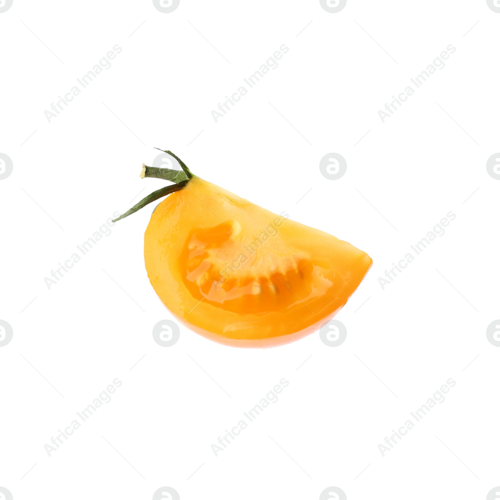 Piece of delicious ripe yellow tomato isolated on white Photo of Piece of delicious ripe yellow tomato isolated on white
