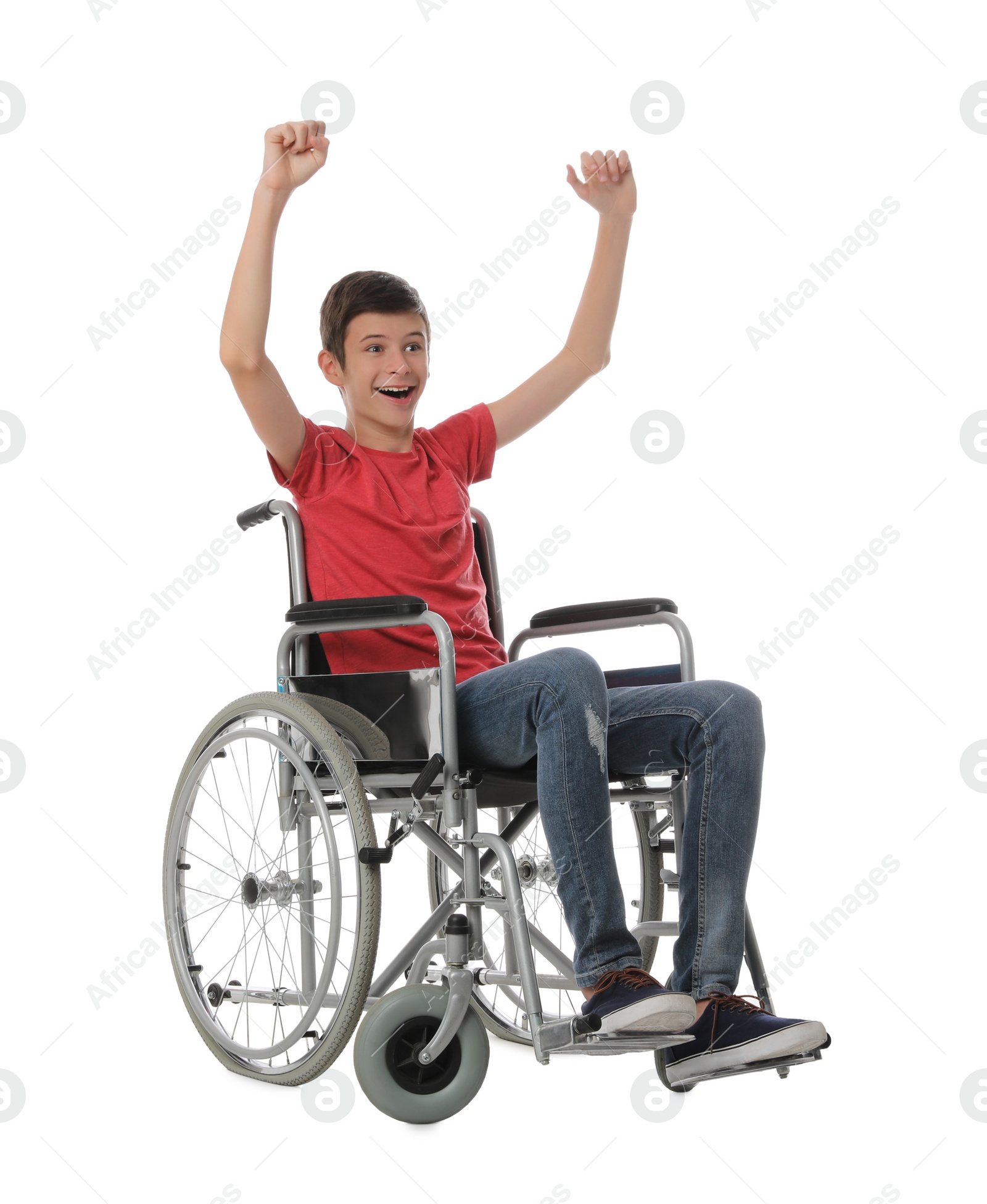 Emotional teen boy in wheelchair on white background Photo of Emotional teen boy in wheelchair on white background