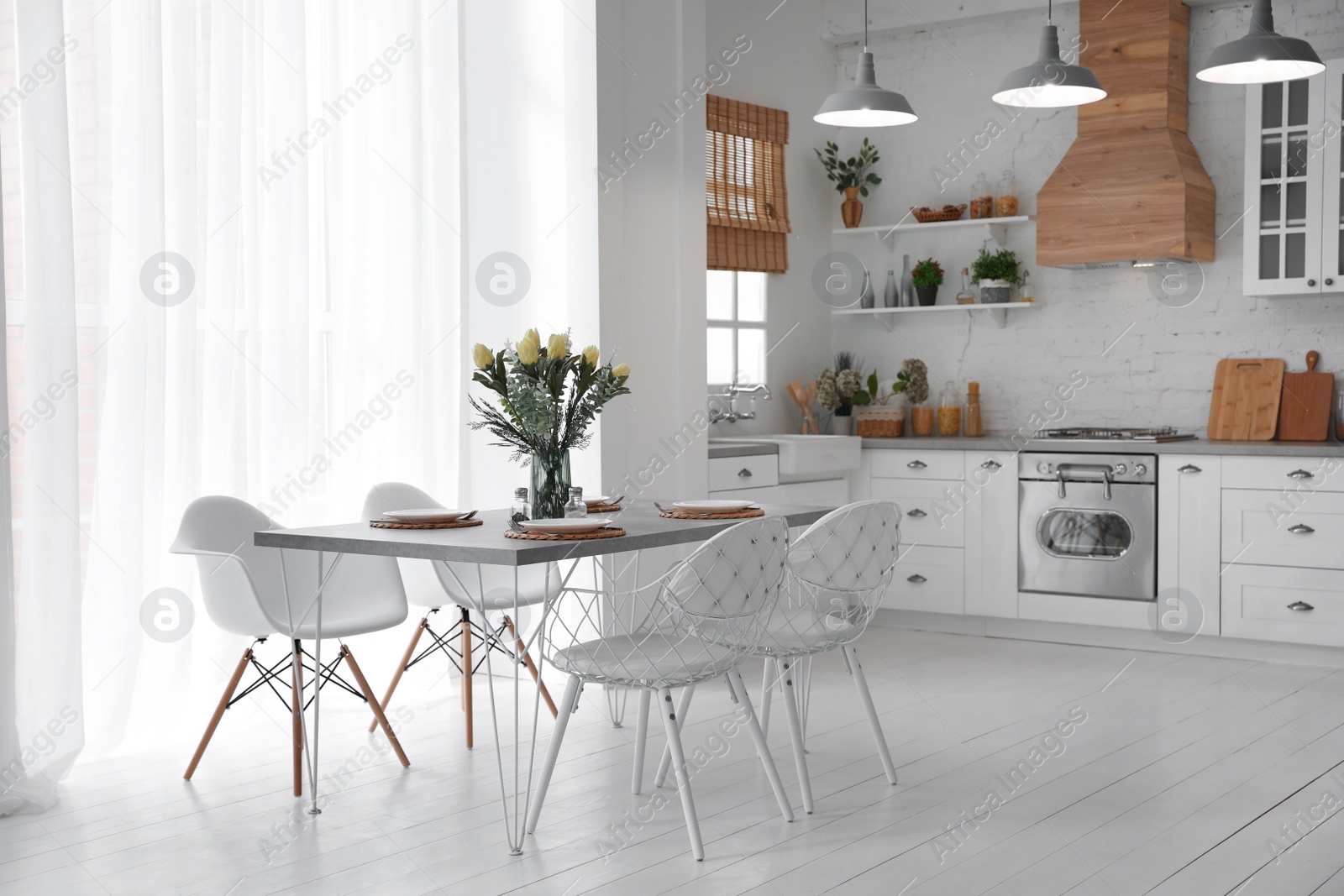 Photo of Beautiful kitchen interior with new stylish furniture