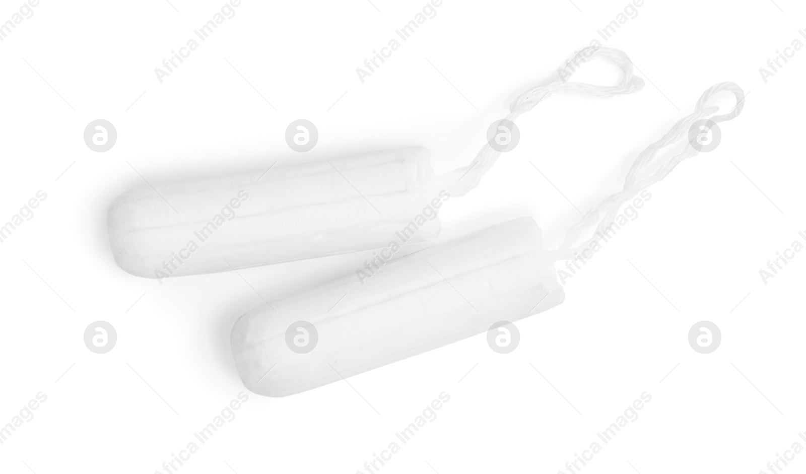 Tampons on white background, top view. Menstrual hygiene product Photo of Tampons on white background, top view. Menstrual hygiene product