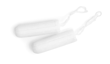 Tampons on white background, top view. Menstrual hygiene product Photo of Tampons on white background, top view. Menstrual hygiene product
