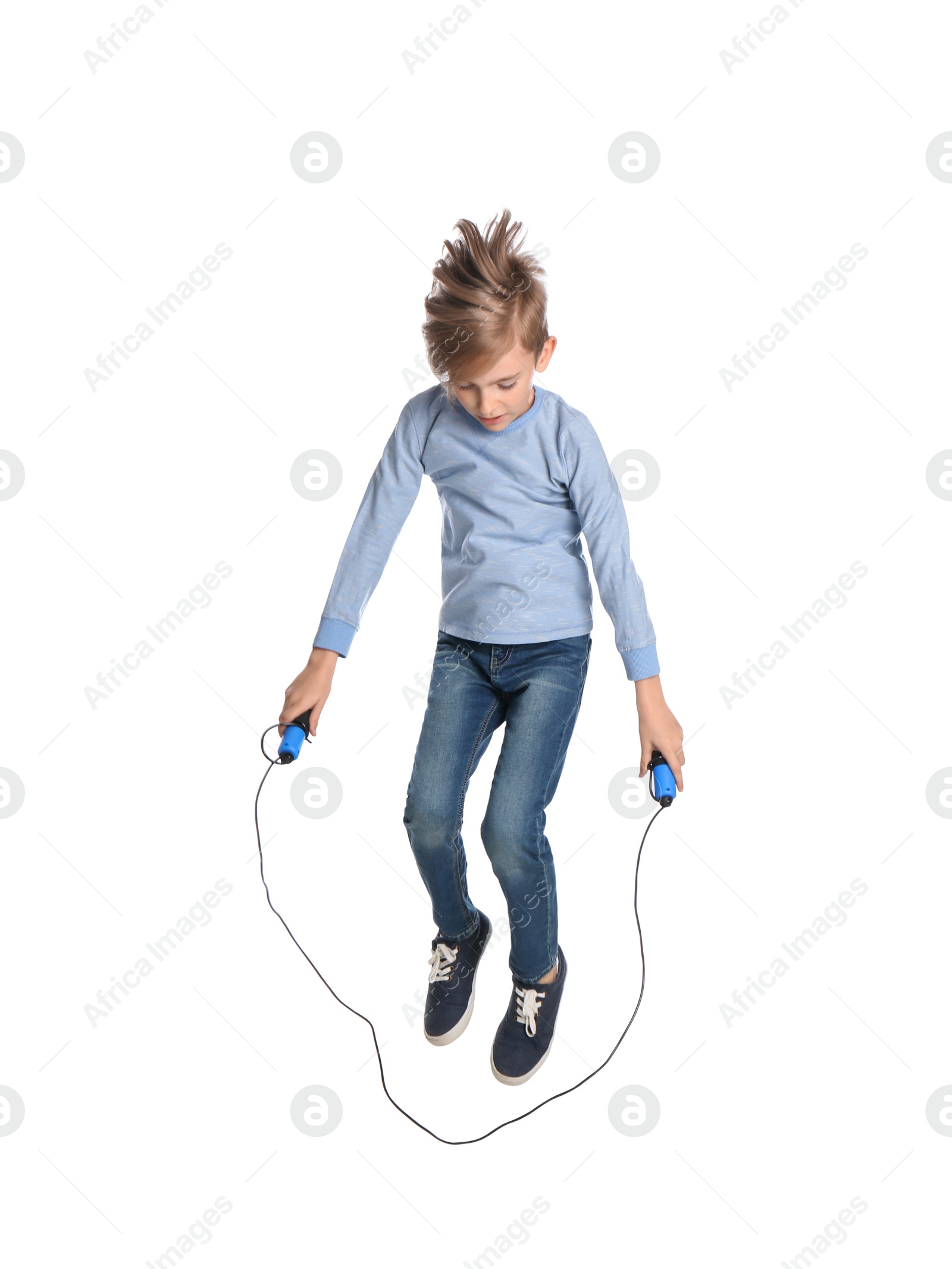 Cute little boy with jump rope on white background Photo of Cute little boy with jump rope on white background