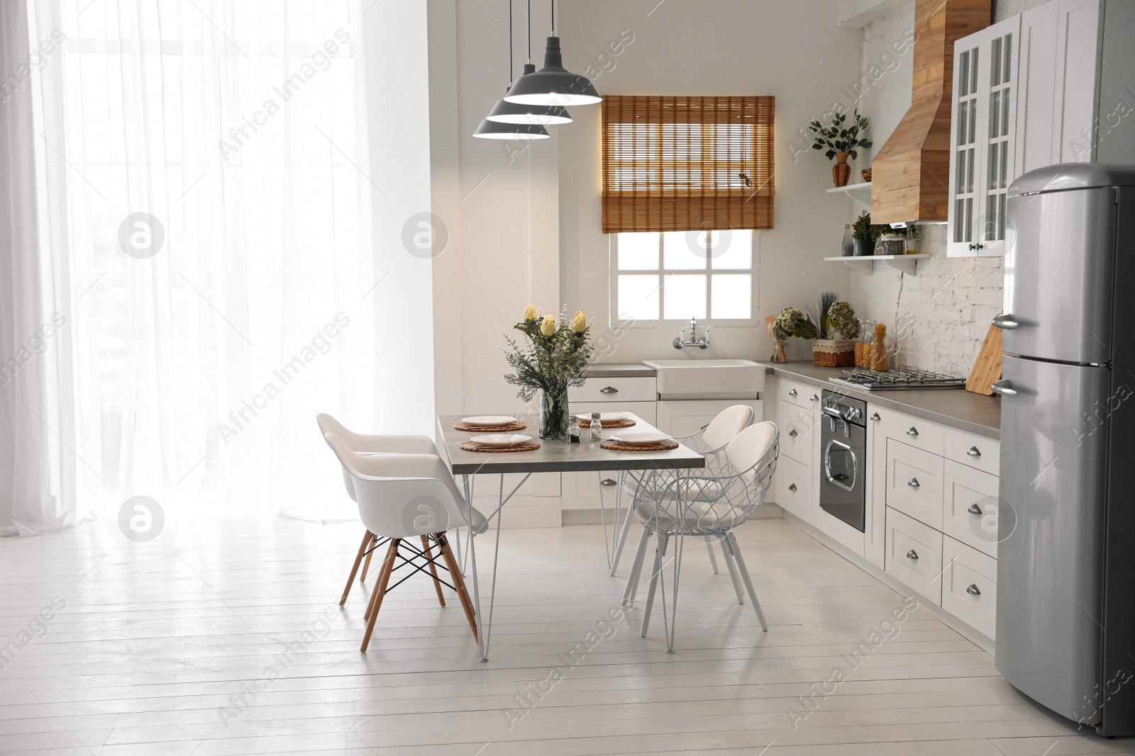 Beautiful kitchen interior with new stylish furniture Photo of Beautiful kitchen interior with new stylish furniture