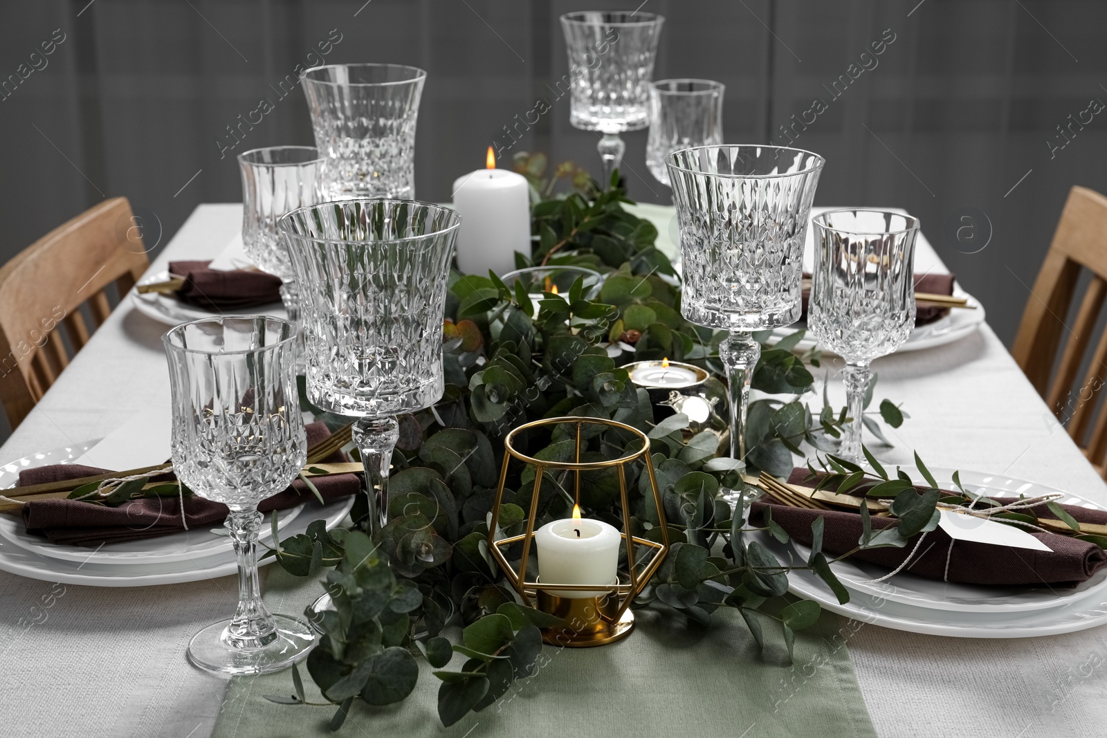 Stylish elegant table setting for festive dinner indoors Photo of Stylish elegant table setting for festive dinner indoors