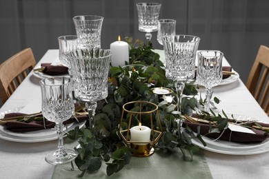 Stylish elegant table setting for festive dinner indoors Photo of Stylish elegant table setting for festive dinner indoors