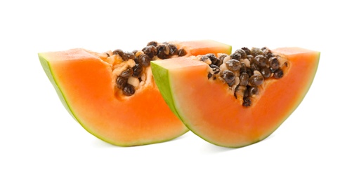 Fresh ripe papaya slices on white background Photo of Fresh ripe papaya slices on white background