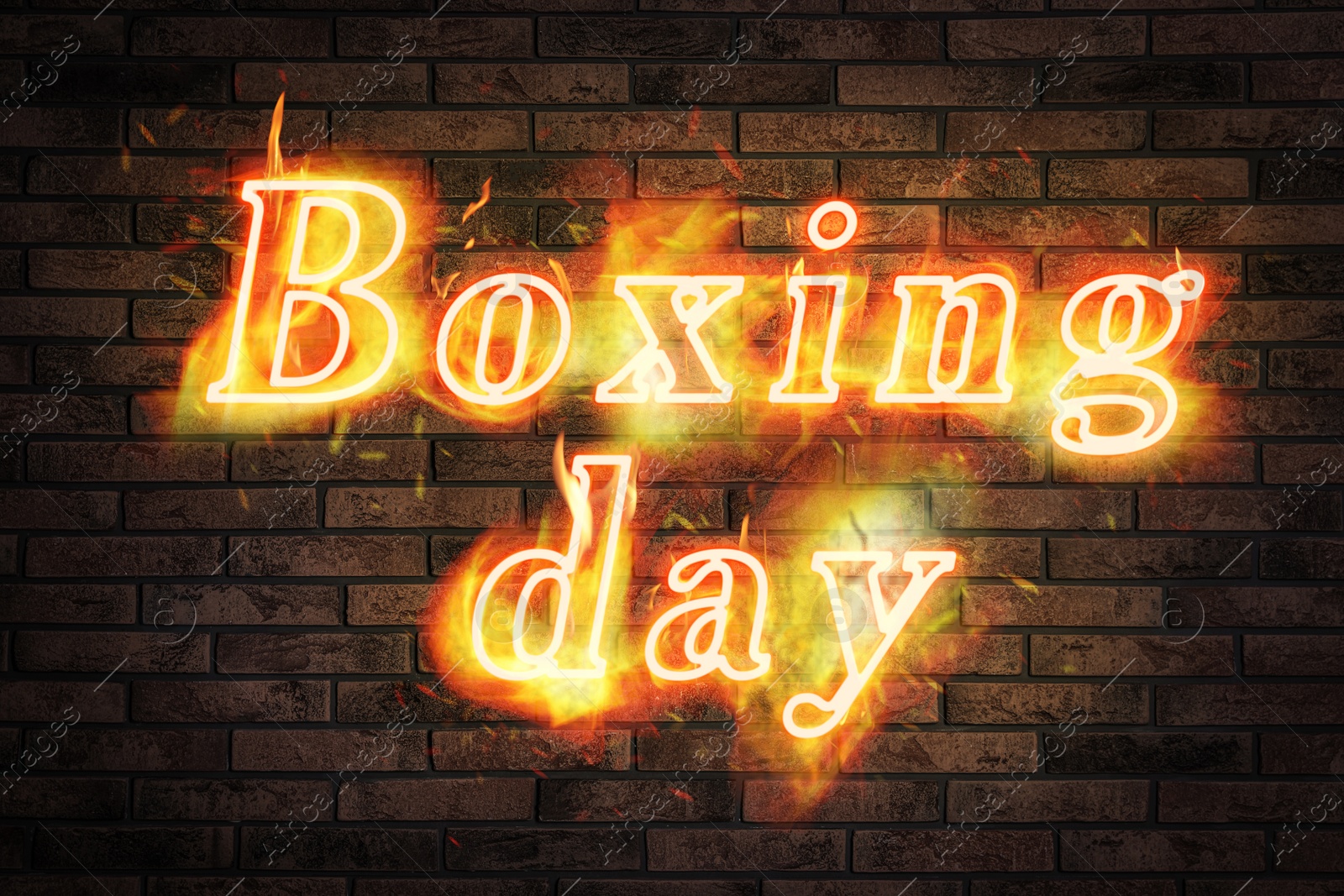 Image of Flaming text Boxing Day against brick wall
