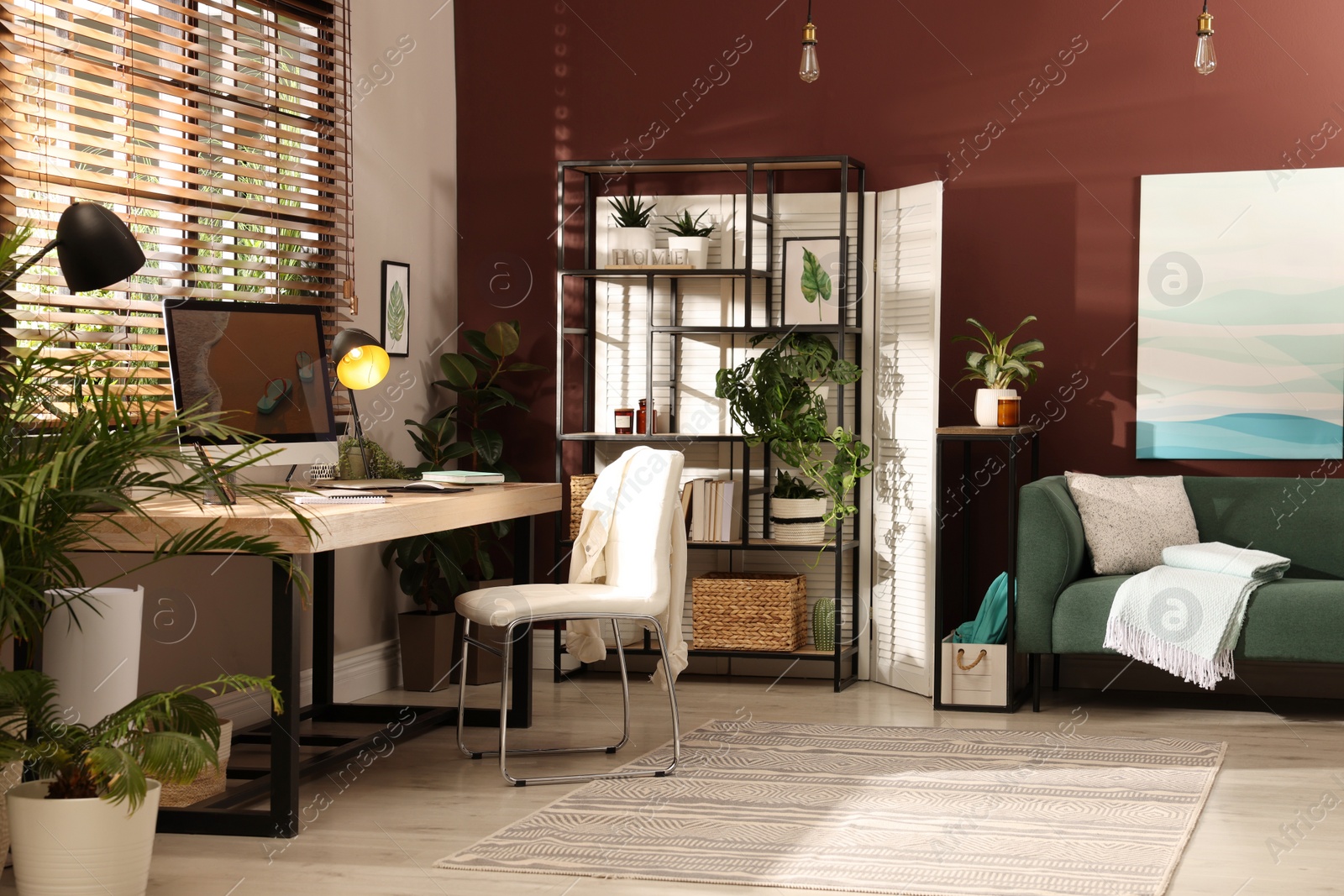 Light room interior with comfortable workplace near window Photo of Light room interior with comfortable workplace near window