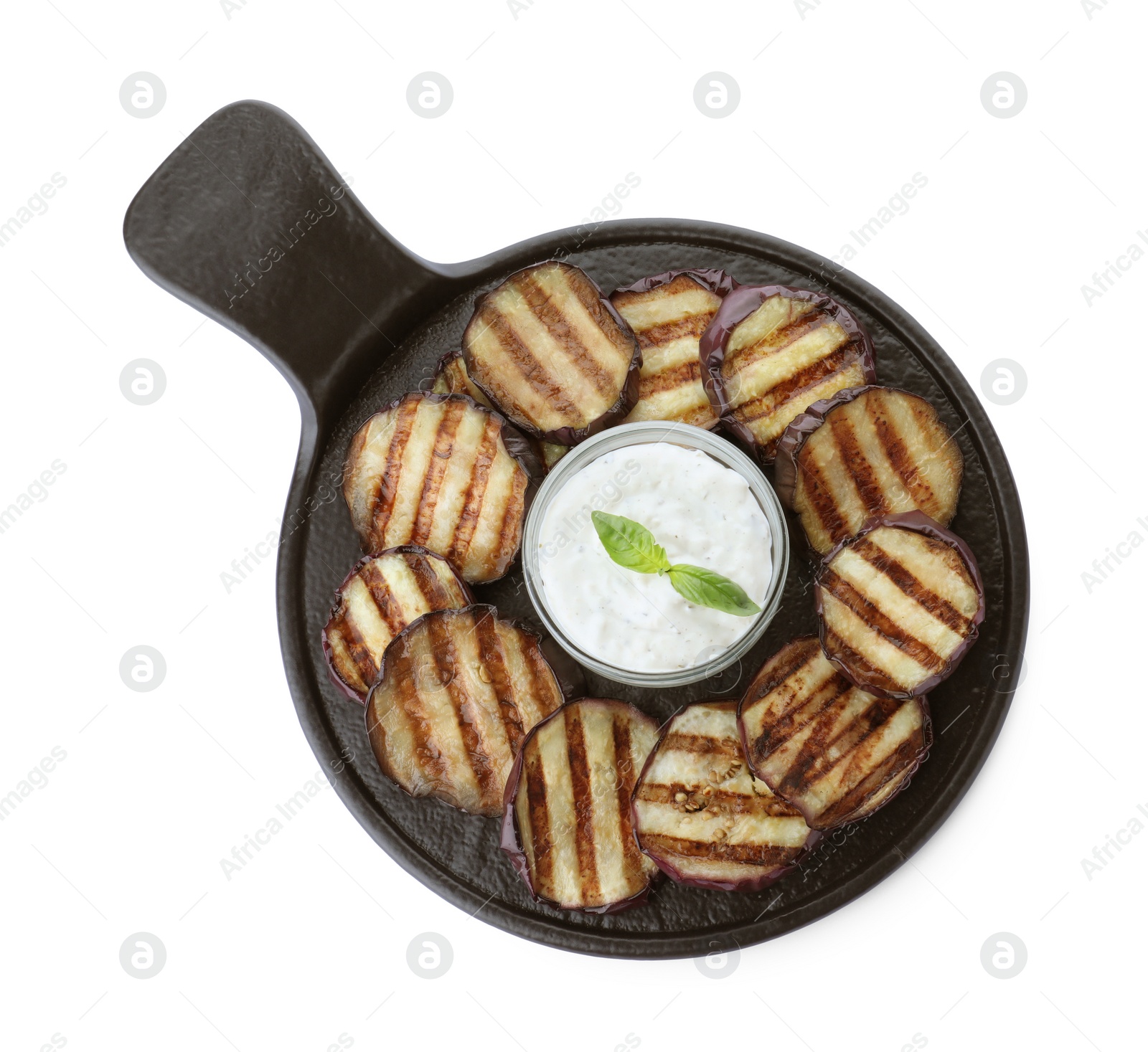 Slate plate of delicious grilled eggplant slices with sauce isolated on white, top view Photo of Slate plate of delicious grilled eggplant slices with sauce isolated on white, top view