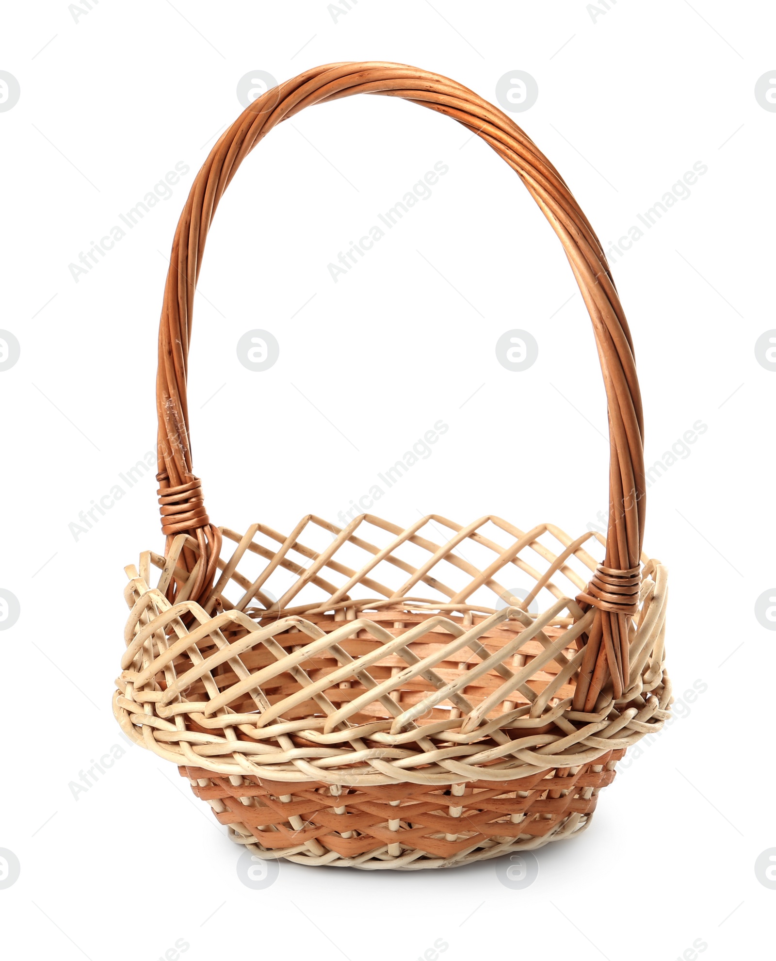 Empty wicker basket isolated on white. Easter item Photo of Empty wicker basket isolated on white. Easter item