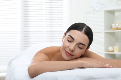 Beautiful young woman relaxing in spa salon Photo of Beautiful young woman relaxing in spa salon
