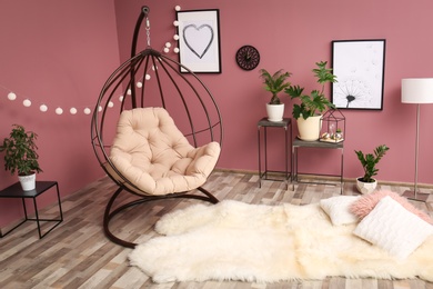 Stylish interior design with tropical leaves Photo of Stylish interior design with tropical leaves