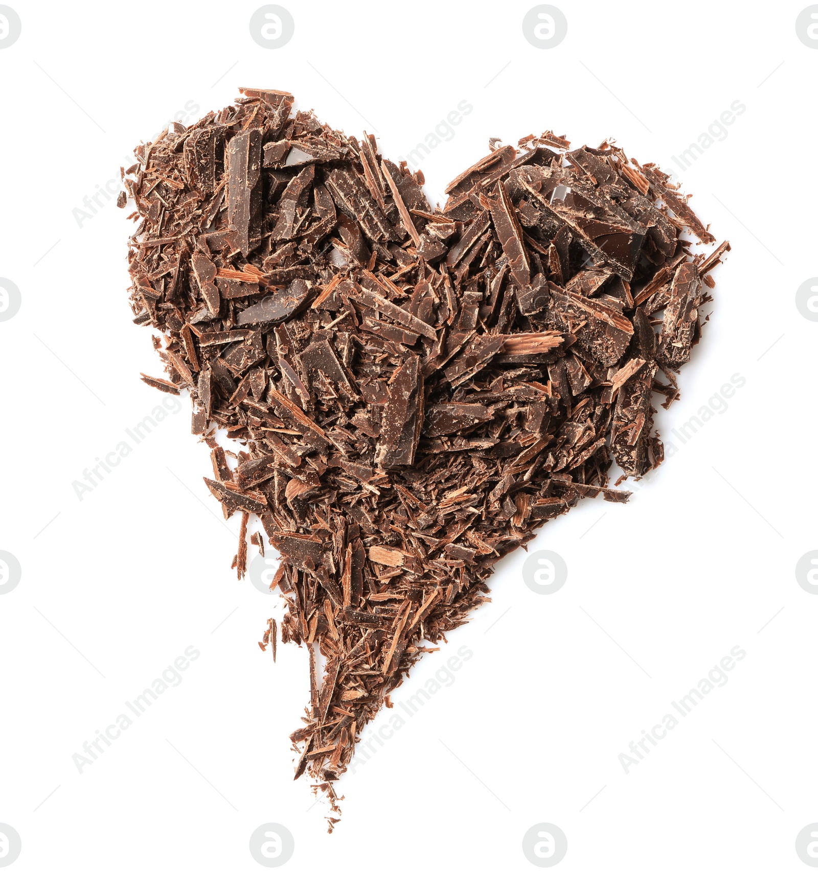 Heart made with dark chocolate crumbles on white background, top view Photo of Heart made with dark chocolate crumbles on white background, top view