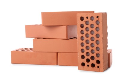 Many red bricks on white background. Building material Photo of Many red bricks on white background. Building material
