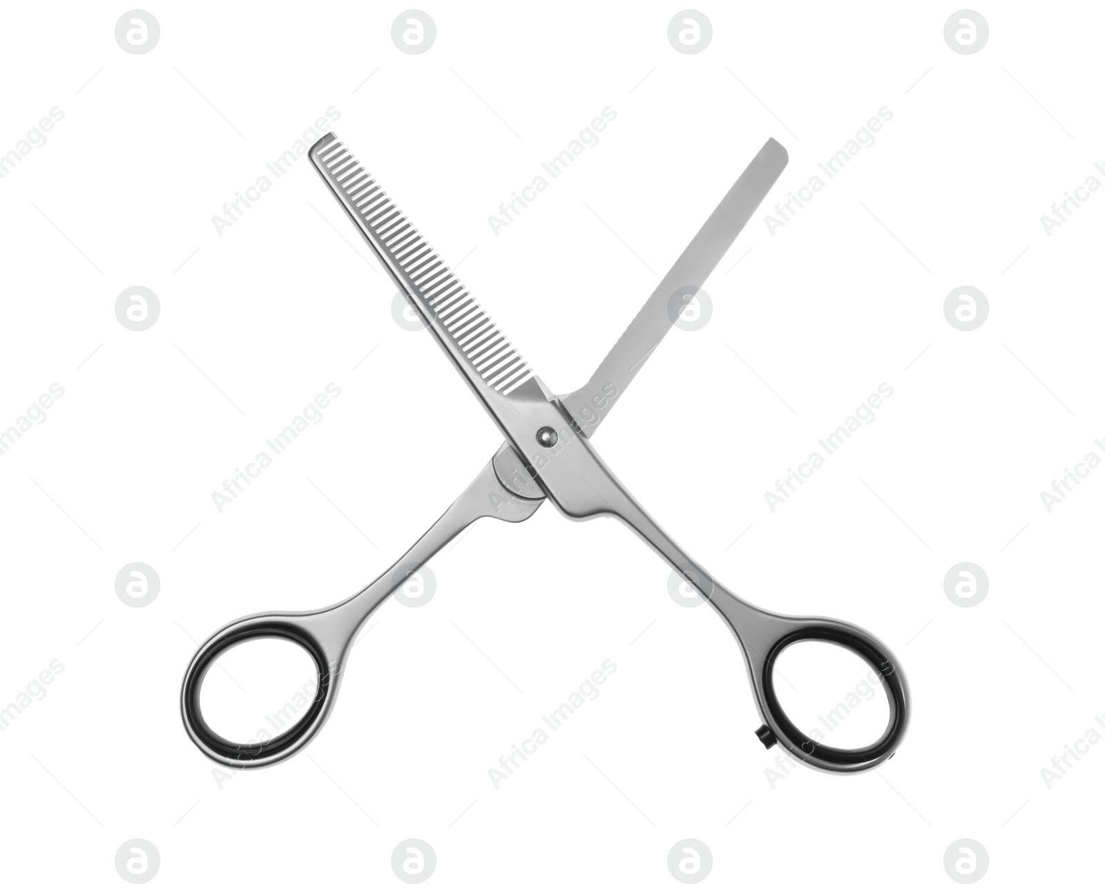 Professional hairdresser thinning scissors isolated on white. Haircut tool Photo of Professional hairdresser thinning scissors isolated on white. Haircut tool