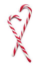 Sweet candy canes on white background, top view. Christmas treat Image of Sweet candy canes on white background, top view. Christmas treat
