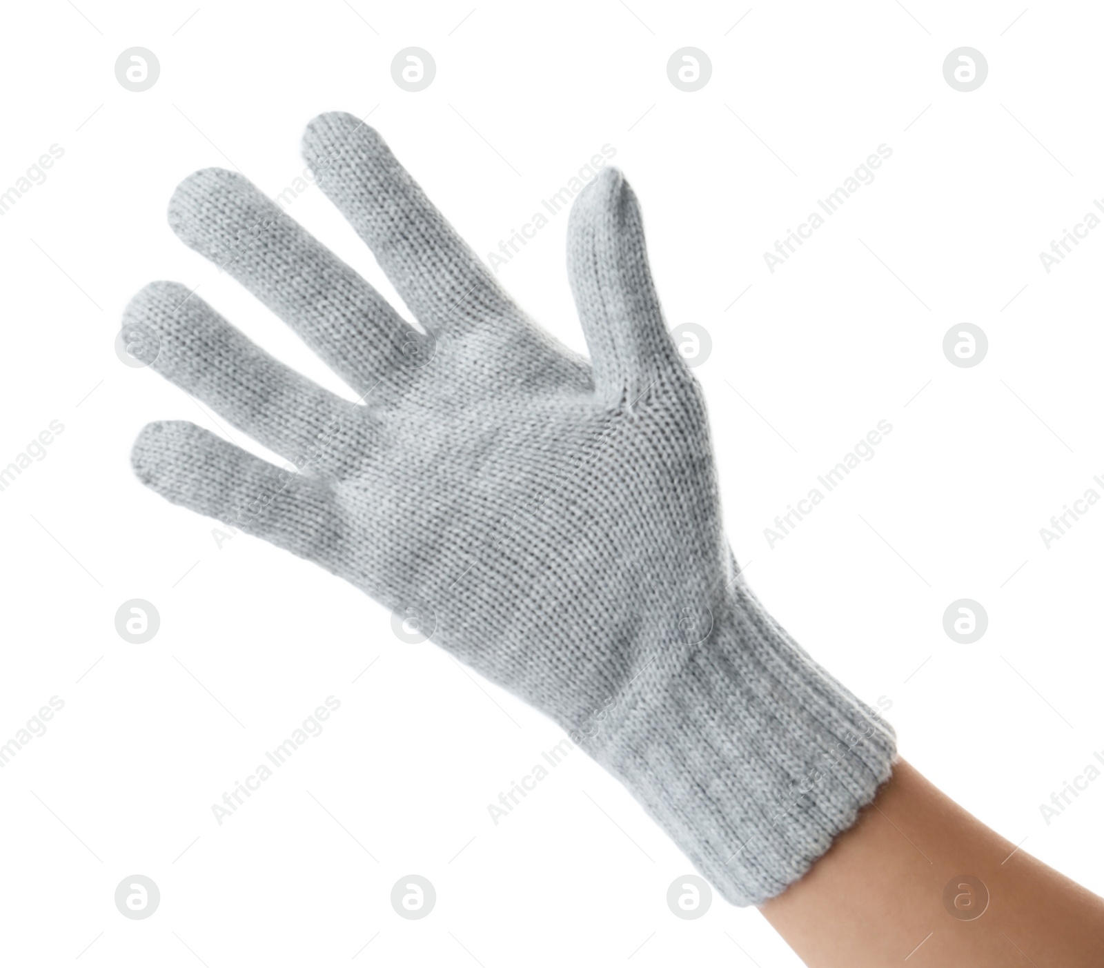 Woman wearing grey woolen glove on white background, closeup Photo of Woman wearing grey woolen glove on white background, closeup