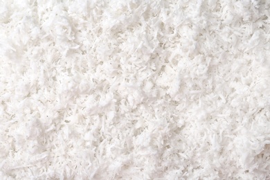 Fresh coconut flakes, closeup Photo of Fresh coconut flakes, closeup