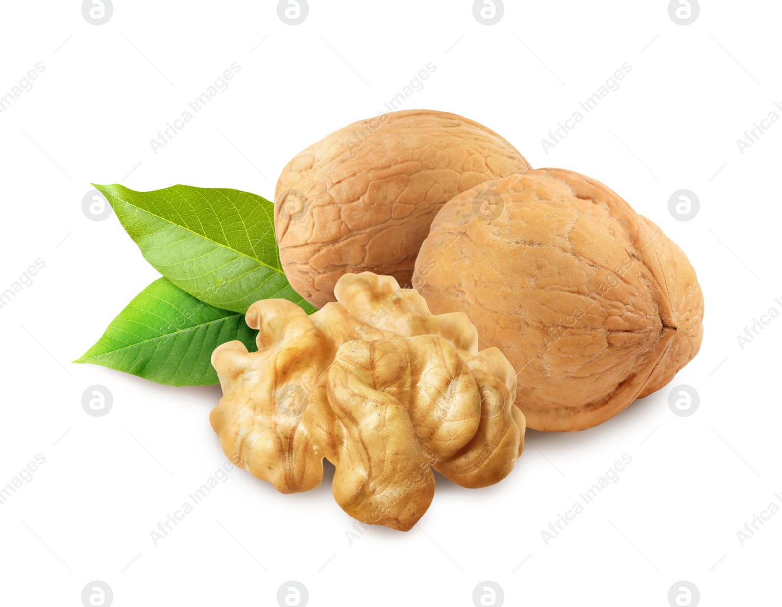 Tasty walnuts and green leaves on white background Image of Tasty walnuts and green leaves on white background