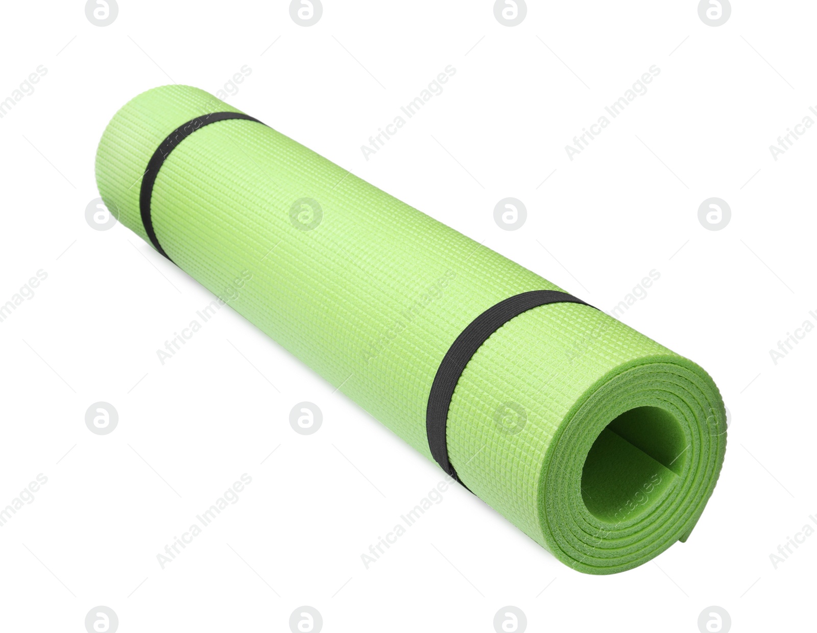 Rolled light green camping mat isolated on white Photo of Rolled light green camping mat isolated on white