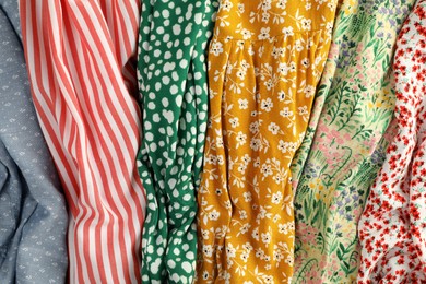 Different clothes as background, closeup. Diversity concept Photo of Different clothes as background, closeup. Diversity concept