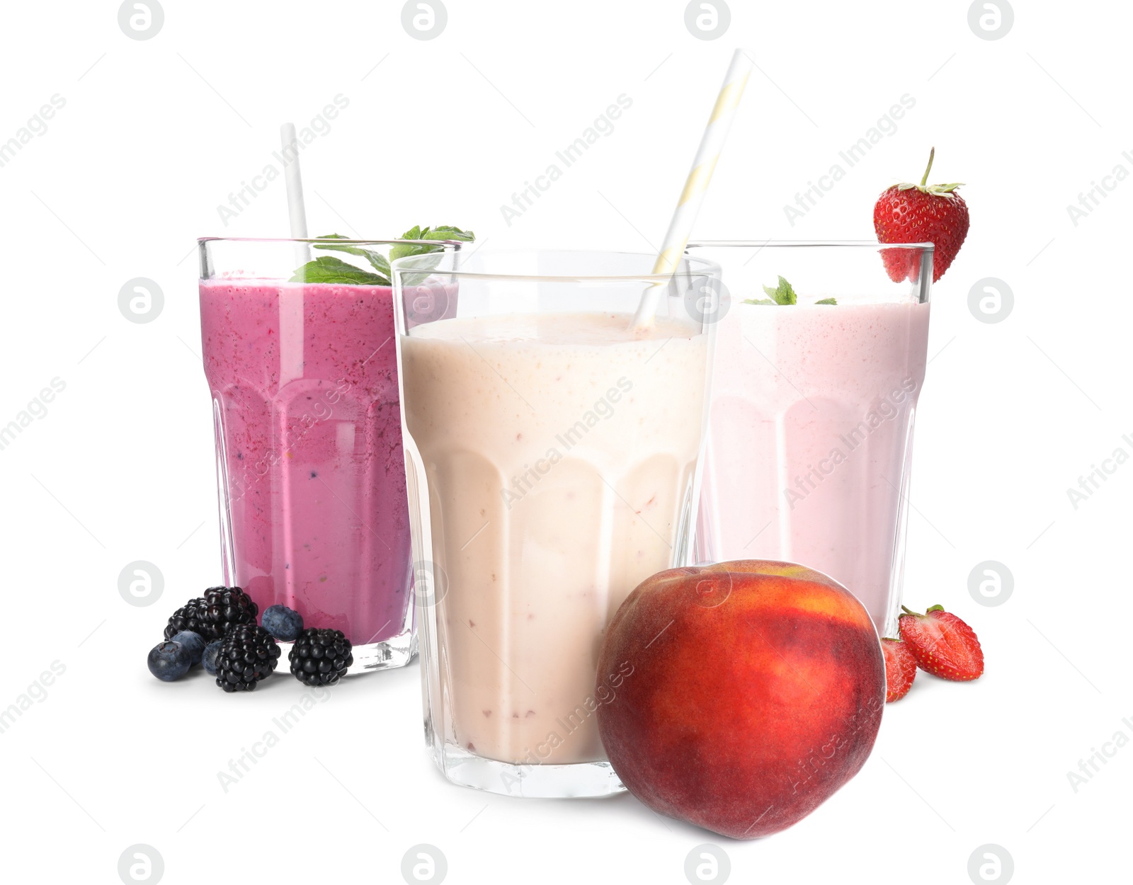 Three tasty milk shakes on white background Image of Three tasty milk shakes on white background