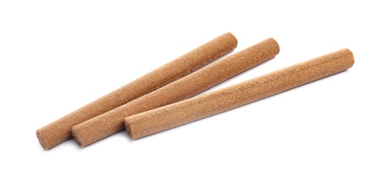 Many aromatic incense sticks on white background Photo of Many aromatic incense sticks on white background