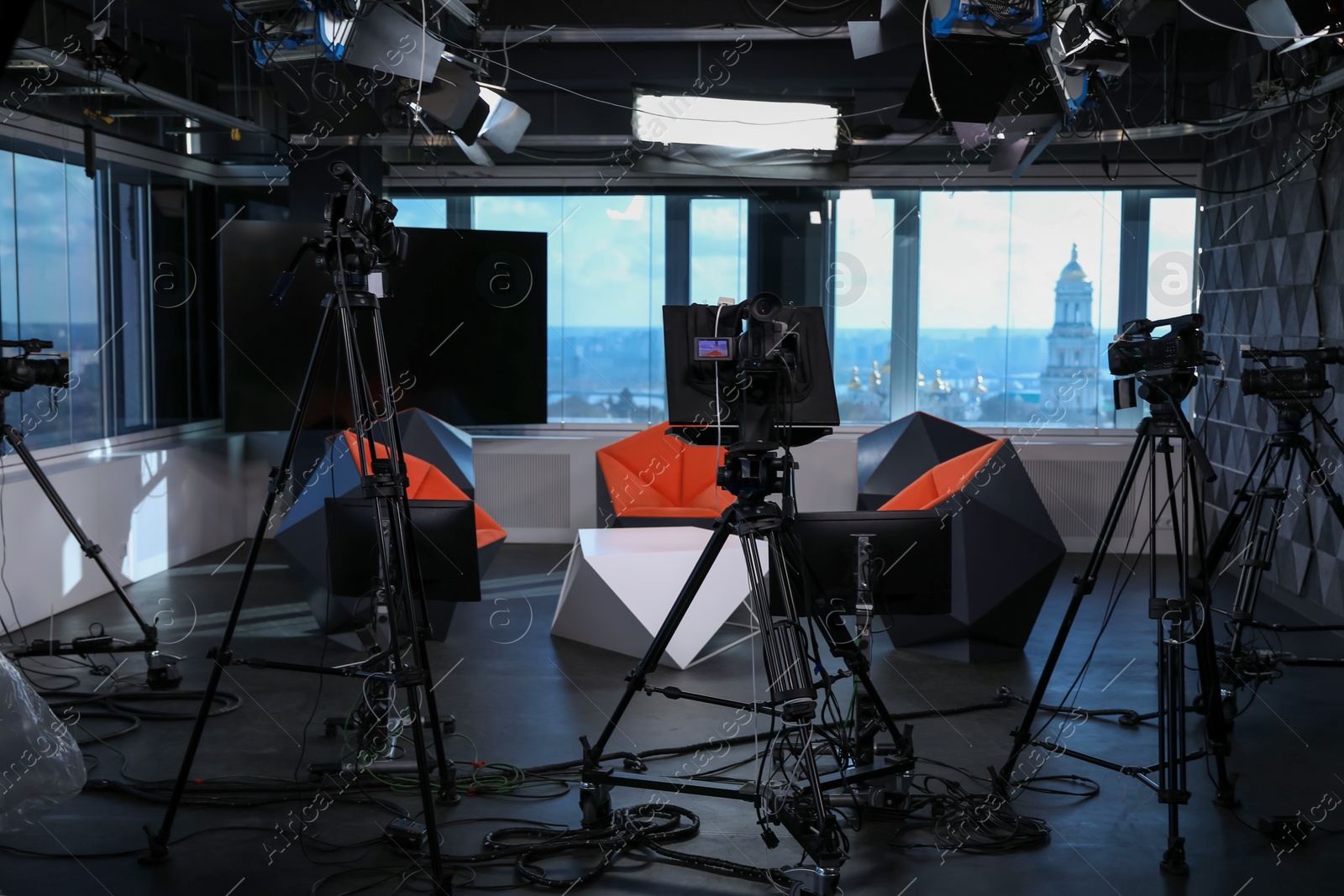 Modern video recording studio with professional cameras Photo of Modern video recording studio with professional cameras