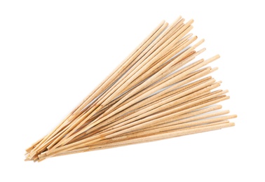 Many aromatic incense sticks on white background Photo of Many aromatic incense sticks on white background