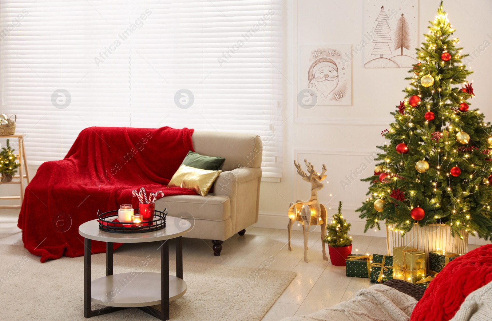 Living room with Christmas decorations. Festive interior design Photo of Living room with Christmas decorations. Festive interior design