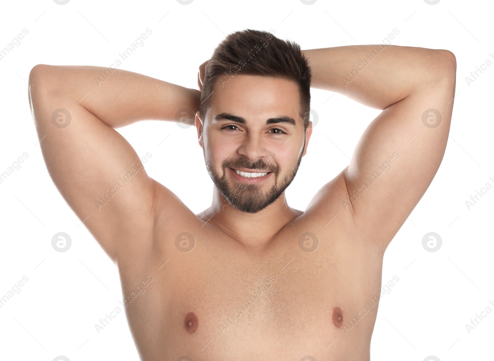 Young man showing hairless armpits after epilation procedure on white background Image of Young man showing hairless armpits after epilation procedure on white background