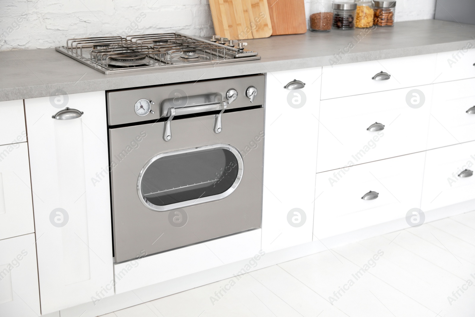 New modern oven in stylish kitchen. Cooking appliance Photo of New modern oven in stylish kitchen. Cooking appliance