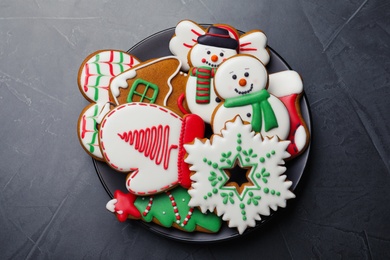 Delicious Christmas cookies on black table, top view Photo of Delicious Christmas cookies on black table, top view