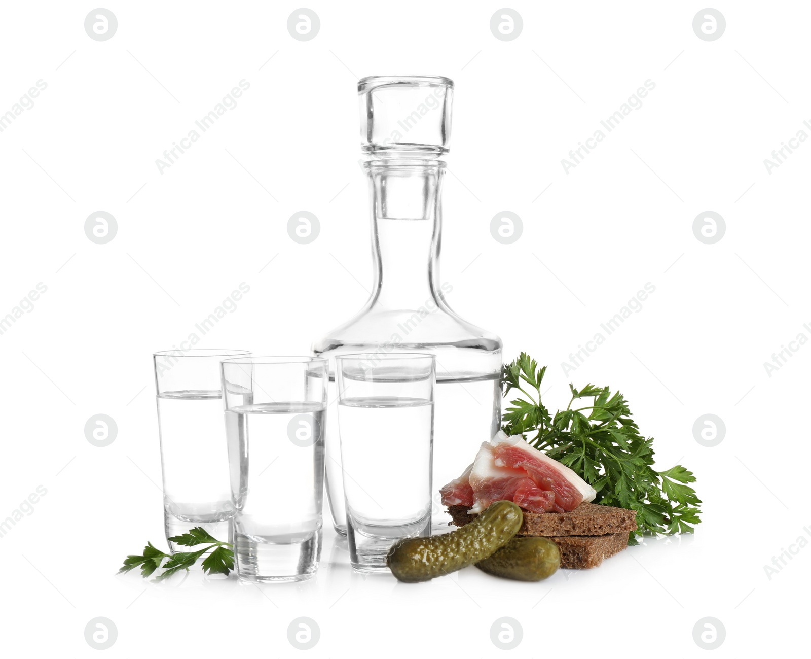 Russian vodka and different appetizers isolated on white Photo of Russian vodka and different appetizers isolated on white