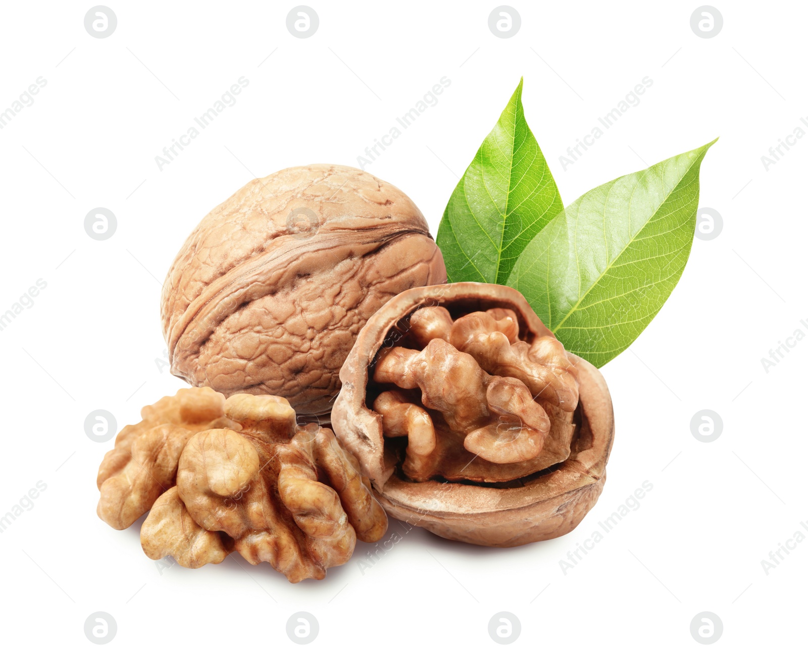 Tasty walnuts and green leaves on white background Image of Tasty walnuts and green leaves on white background