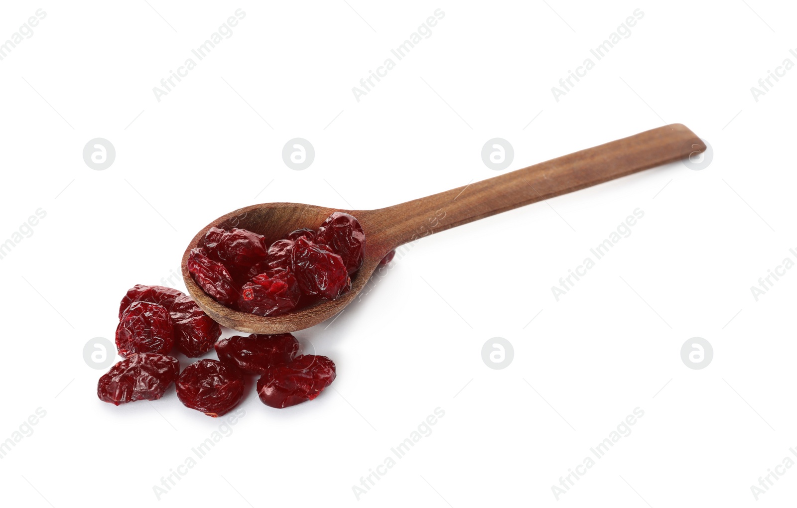 Dried cranberries and wooden spoon on white background Photo of Dried cranberries and wooden spoon on white background