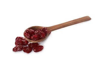 Dried cranberries and wooden spoon on white background Photo of Dried cranberries and wooden spoon on white background
