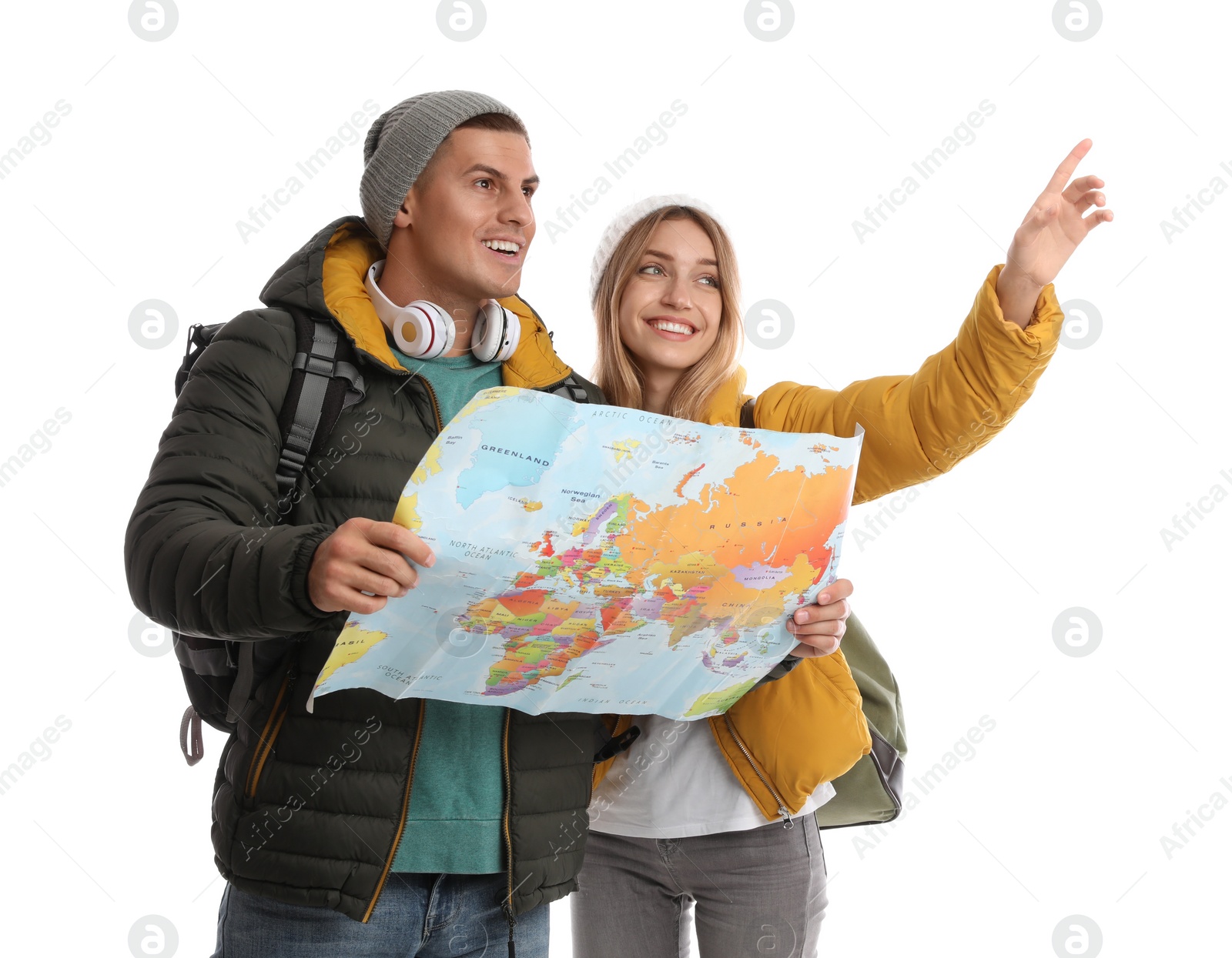 Couple with map on white background. Winter travel Photo of Couple with map on white background. Winter travel